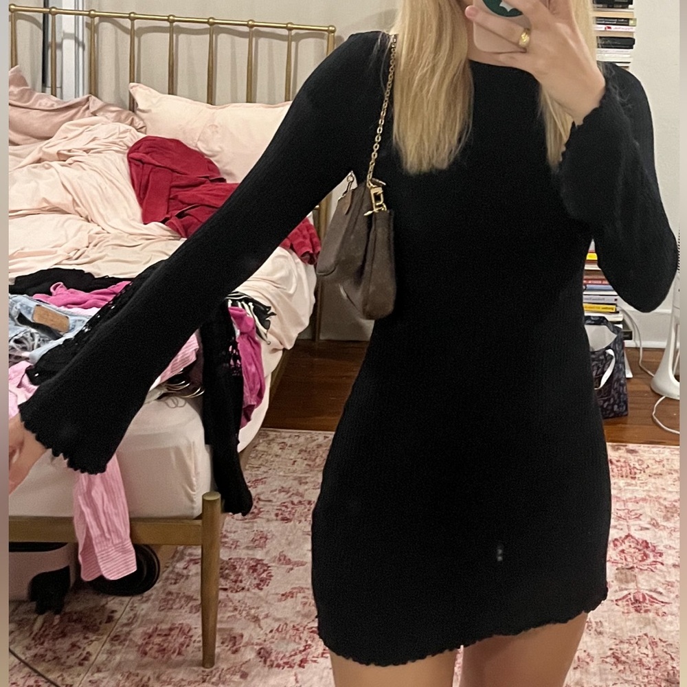 Reformation knit sweater dress with long sleeve and ruffled edges